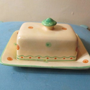 Yellow and green ceramic butter dish.   vintage\ceramic\butter dish\kitchen ware\household\vintage butter dish