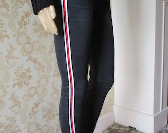 Black stretch jeans with a red and white stripe on legs, . jeans\retro\trousers\pants\vintage jeans\stretch jeans\black jeans