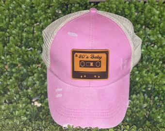 Gorra de camionero con cola de caballo rosa