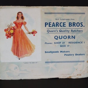 May include: A vintage advertisement for Pearce Bros. Butchers in Quorn, featuring a woman in a red dress holding a bouquet of flowers. The text reads "With Compliments from Pearce Bros. Quorn's Quality Butchers Quorn Phones: Shop 69 Residence I Box 17 Smallgoods Makers Poultry Dealers"
