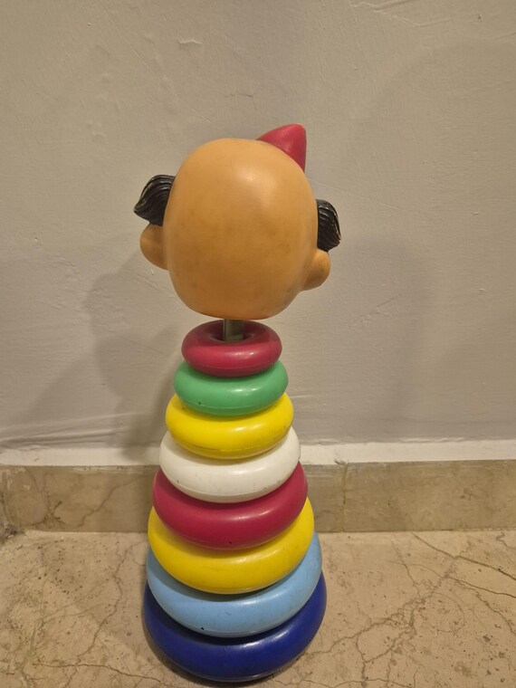 Juguete vintage con temática de payaso de la marca Educo