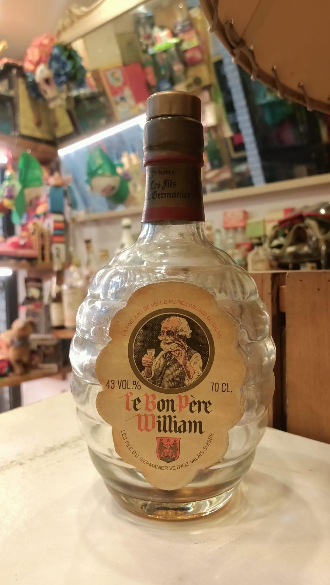 Vintage Bottle of Famous Pear Cognac Branded 