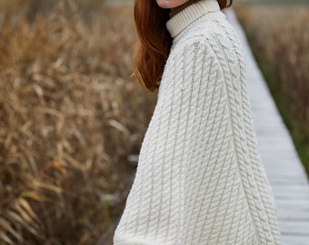 Saol Aran Fisherman Cable Knit Poncho,  Turtleneck Merino Wool Poncho, Irish Merino Wool Poncho in White & Wine Color, Made in Ireland