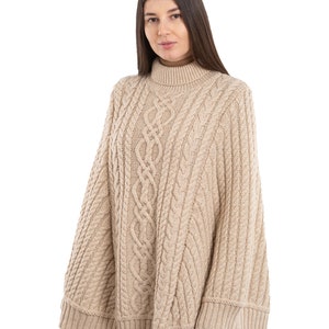 Saol Aran Fisherman Cable Knit Poncho, Turtleneck Merino Wool Poncho, Irish Merino Wool Poncho in White & Wine Color, Made in Ireland Parsnip