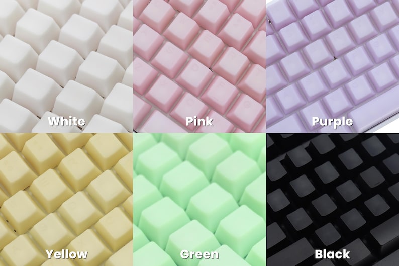 May include: A collection of colorful keyboard keycaps in white, pink, purple, yellow, green, and black. Each color is labeled with its name. The keycaps are square and arranged in a grid pattern.