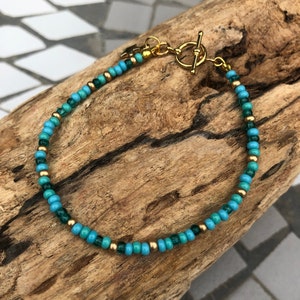 Turquoise, Green and Gold Surfer-style Seed Bead bracelet with Gold Star Charm