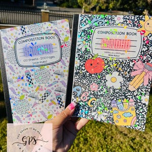 May include: Two composition notebooks with colorful, holographic designs. One has a pattern of school supplies, the other has flowers and ABCs. Both have the name "SANDHU" and the text "COMPOSITION BOOK" on the cover. Each notebook contains 100 sheets and 200 pages.