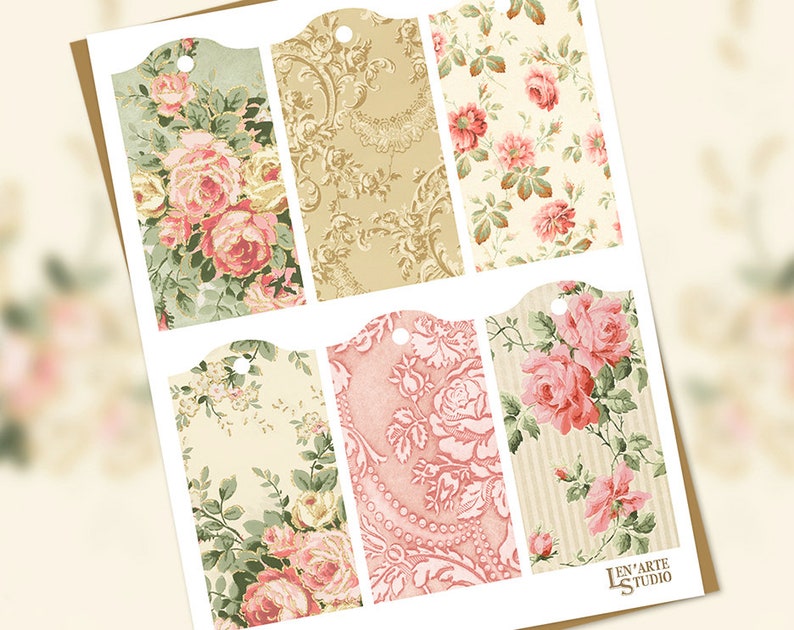 May include: Set of six printable gift tags featuring vintage floral patterns with pink roses and green leaves. The tags have a scalloped edge and a hole for string.