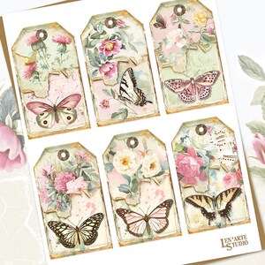 Pode incluir: Conjunto de seis etiquetas para presentes de estilo vintage com borboletas e desenhos florais. Cada etiqueta tem um visual desgastado e envelhecido com uma combina&ccedil;&atilde;o de cores rosa, verde e branco. As etiquetas s&atilde;o perfeitas para adicionar um toque de fantasia aos presentes ou aos trabalhos manuais.
