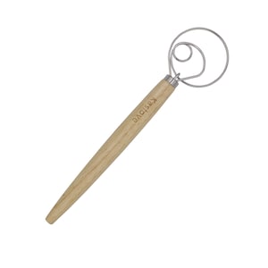 May include: A Danish dough whisk with a wooden handle and a stainless steel wire loop. The handle is light brown and has the word "Kaslove" printed on it. The whisk is designed for mixing dough and other baking ingredients.