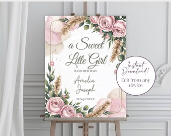 May include: A sign with the text "a Sweet Little Girl is on her way" surrounded by pink roses, wheat, and green leaves. The sign also includes the names Amelia and Joseph, and the date 24 Sept 20XX. A circle on the right says "Instant Download!"