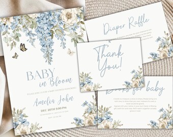 Op de afbeelding: Babyshower uitnodiging en kaarten met bloemen- en vlinderontwerpen. De uitnodiging luidt "Baby in Bloom" en bevat evenementdetails. Kaarten met "Diaper Raffle", "Thank You!" en "Books for baby". Zachte blauwe en crèmekleuren.