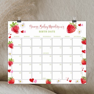 May include: A printable calendar with a strawberry theme for a baby shower. The calendar is titled "Guess Baby Madison's Birth Date" and has a strawberry graphic on the top. The calendar is for the month of May and June.