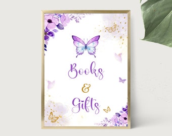 Puede incluir: Un letrero enmarcado con fondo blanco, con flores y mariposas moradas en acuarela. El texto "Books & Gifts" está escrito en escritura morada. Acentos dorados y un marco dorado completan el diseño, adecuado para un baby shower o fiesta.