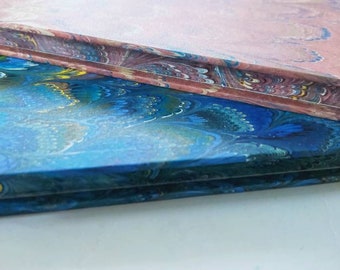 Guest book / marble paper with hand decorated edge. Lined pages inside