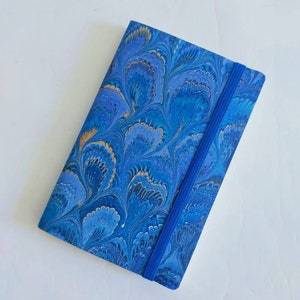 Blue and gold 100% recycled soft cover journal, hand marbled withbookmark and elastic band