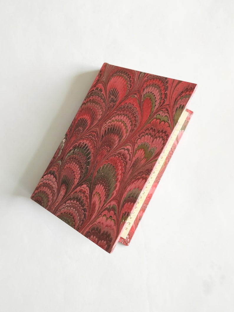 Small address book, red hand marbled