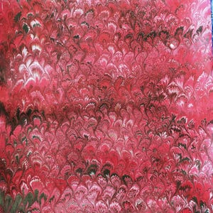 Hand marbled sheet of paper - midnight blue and yellow bookbinding paper - decoupage paper - scrapbooking paper - red peacock pattern paper