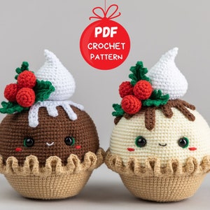 May include: Two crocheted Christmas pudding ornaments with cute faces. The puddings are topped with white frosting and red holly berries.  PDF CROCHET PATTERN.