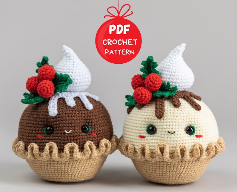 May include: Two crocheted Christmas pudding ornaments with cute faces. The puddings are topped with white frosting and red holly berries.  PDF CROCHET PATTERN.