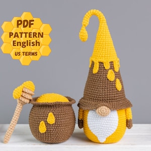 May include: Crochet pattern for a honeybee gnome with a pot of honey. The pattern is written in US terms and includes instructions for making the gnome, hat, beard, and pot of honey.