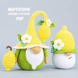 May include: Crocheted gnome figures with yellow hats, green bodies, and white beards. The gnomes are holding yellow lemons and decorated with white flowers and green leaves. The text "MUFFICORN CROCHET PATTERN PDF" is at the top.