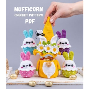May include: A collection of crocheted Easter-themed figures, including bunny-shaped eggs and a gnome-like character, in various colors like yellow, pink, blue, and green. The text "MUFFICORN CROCHET PATTERN PDF" is displayed at the top.