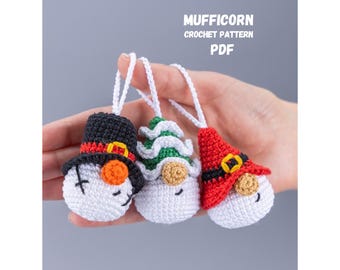 May include: Crochet pattern PDF for three Christmas ornaments: a snowman, a gnome, and a Santa Claus. The ornaments are white with colorful hats and faces.