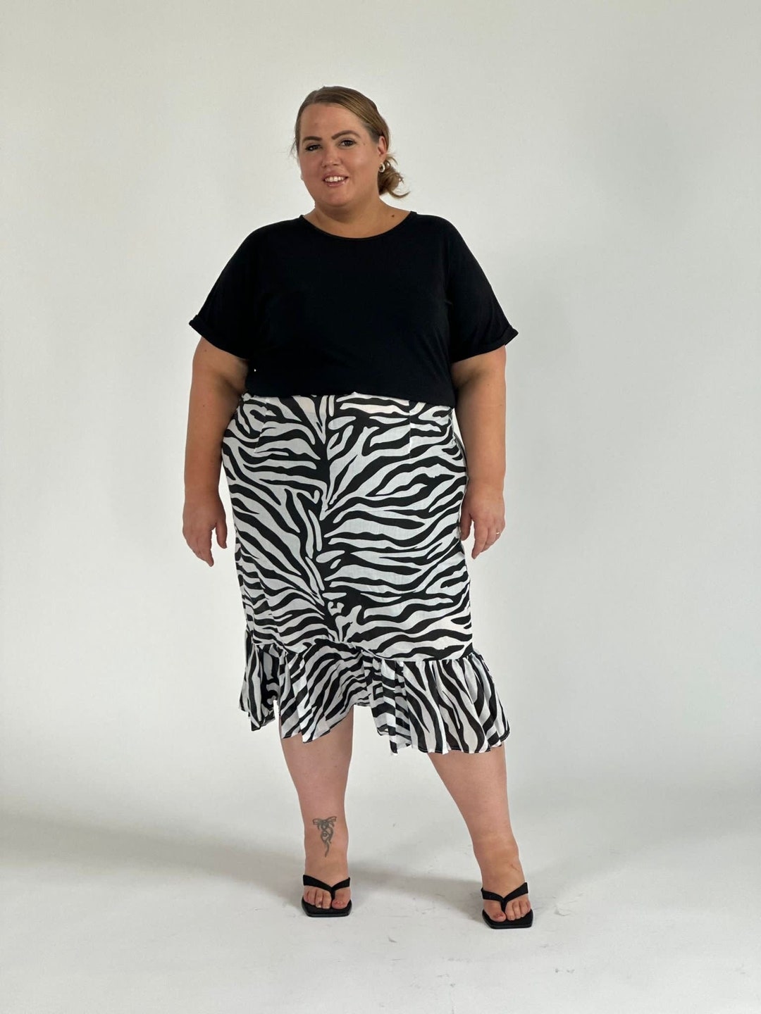 Gonna con orlo a balze in cotone con stampa zebrata Parte di una