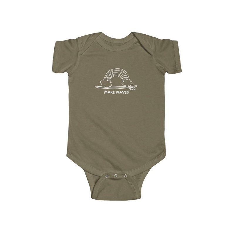 May include: A light green baby onesie with a white outline of a rainbow over a surfboard and the text "MAKE WAVES".