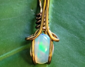 Breathtaking Ethiopian opal Wrapped with vintage bronze coated wire