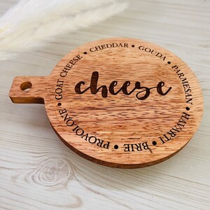 This adorable miniature charcuterie board will give any kitchen or dining area a sweet and personalized touch. These are small and Measure 5” Wide x 6.75” Tall.