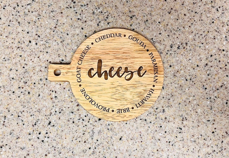 This adorable miniature charcuterie board will give any kitchen or dining area a sweet and personalized touch. These are small and Measure 5” Wide x 6.75” Tall.