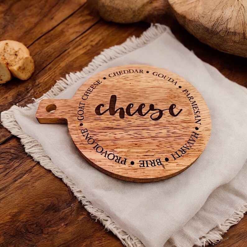 This adorable miniature charcuterie board will give any kitchen or dining area a sweet and personalized touch. These are small and Measure 5” Wide x 6.75” Tall.