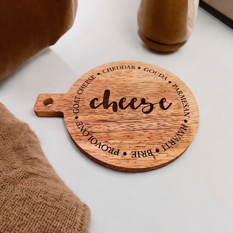 This adorable miniature charcuterie board will give any kitchen or dining area a sweet and personalized touch. These are small and Measure 5” Wide x 6.75” Tall.
