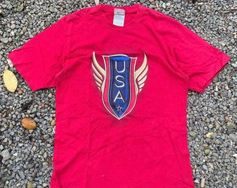 Tênis vintage Nike Swoosh com logo grande da bandeira dos EUA, estilo streetwear, cor vermelha, tamanho M.
