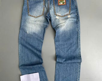 Calça jeans Dolce & Gabbana Era com ilhós e tachas, estilo arquivo Y2K
