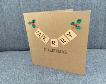 Hand made... Scrabble Merry Christmas greetings card on string with red berry holly.