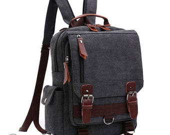 Small Backpack - Canvas Slingback convertible backpack. Black with water resistant Waxed cotton canvas