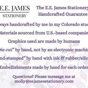 May include: A white informational card with purple text featuring the E.E. James Stationery logo and the Handcrafted Guarantee. It states items are handcrafted in a Colorado studio using U.S.-sourced materials, human-made graphics, and hand-stamping.