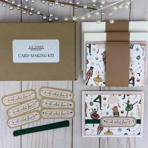 May include: A white ceramic mug with a black handle and the text "But First, Coffee" in a handwritten style. The mug is on a white surface. The mug is 4 inches tall.