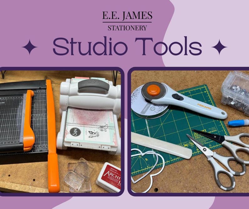 May include: A collection of craft supplies including a black paper trimmer with an orange handle, a white die-cutting machine, clear acrylic blocks, a red ink pad, a rotary cutter, a green cutting mat, scissors, and a metal heart die.