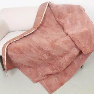 Lambskin blanket in coral red, curly fur, 120 x 200 cm