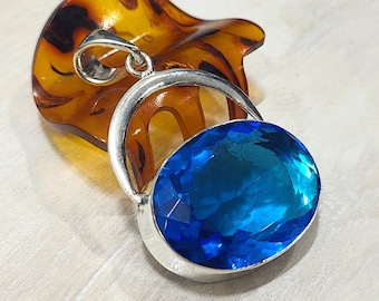 Tanzaniethanger, sterlingzilver, ovale blauwe steen