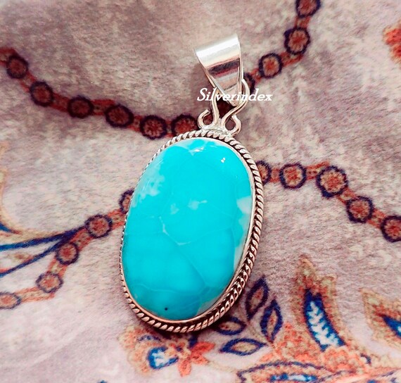 オーバルラリマーペンダント、925スターリングシルバー、スカイブルー