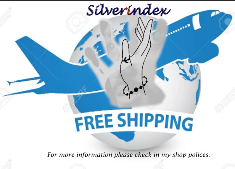 May include: A blue airplane flies over a globe with a hand reaching up. The globe has the words "FREE SHIPPING" written on it. The text "Silverindex" is at the top of the image.