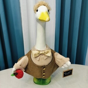 Goose - Mr Teacher with a real chalkboard in his wing , and a apple in the other . Are you Ready for the big spelling test ?