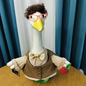 Goose - Mr. Teacher with a real chalkboard in one wing and a  apple in the other . Are you Ready for the big spelling test ????