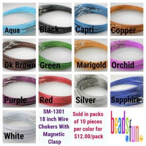 May include: A collection of 18-inch wire chokers with magnetic clasps in various colors, including aqua, black, capri, copper, dark brown, green, marigold, orchid, purple, red, silver, sapphire, and white. The chokers are sold in packs of 10 pieces per color for $12.00 per pack.  SM-1301