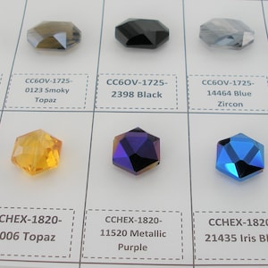 May include: A chart with 10 different crystal beads. The beads are in various colors, including clear, black, blue, purple, and topaz. The beads are labeled with their corresponding codes and names.